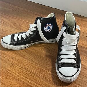 Converse Leather Black and White High-Top Sneakers